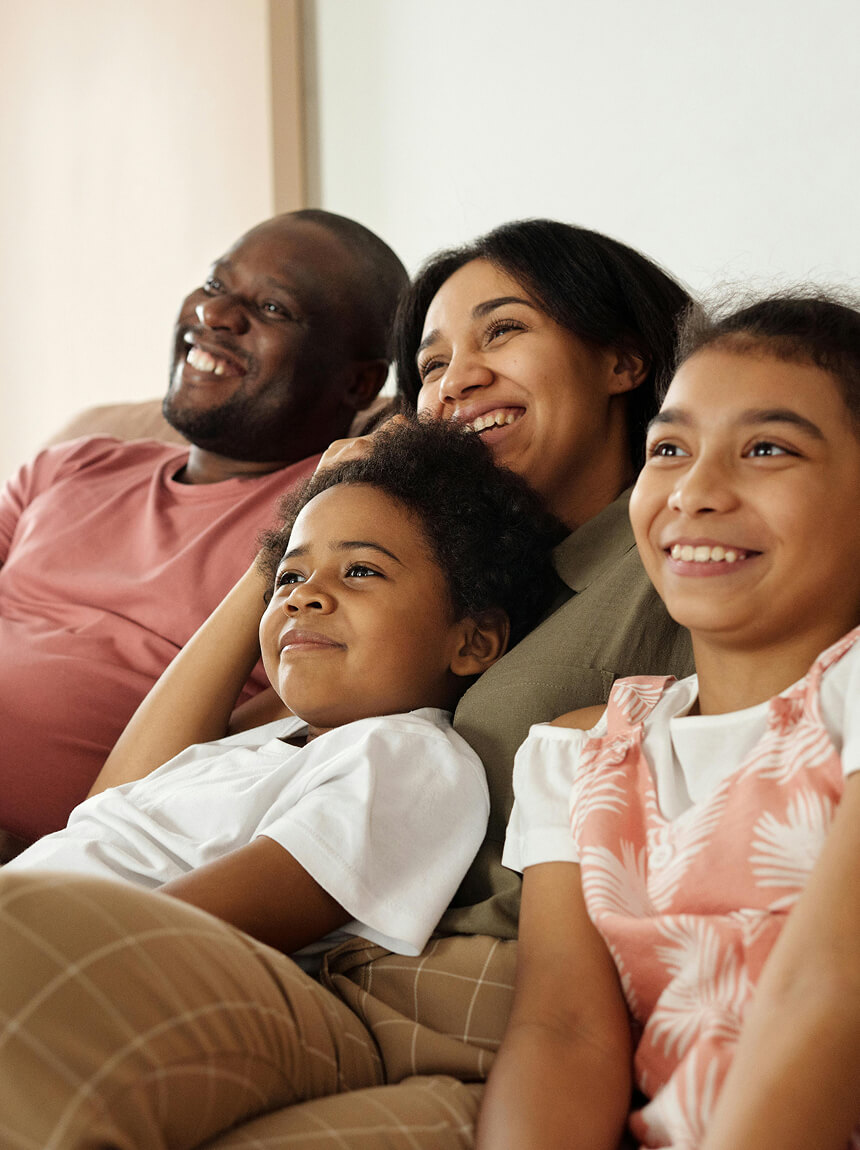 Happy family on sofa