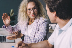 Executive function coaching session helping an adult develop planning and organisational skills.
